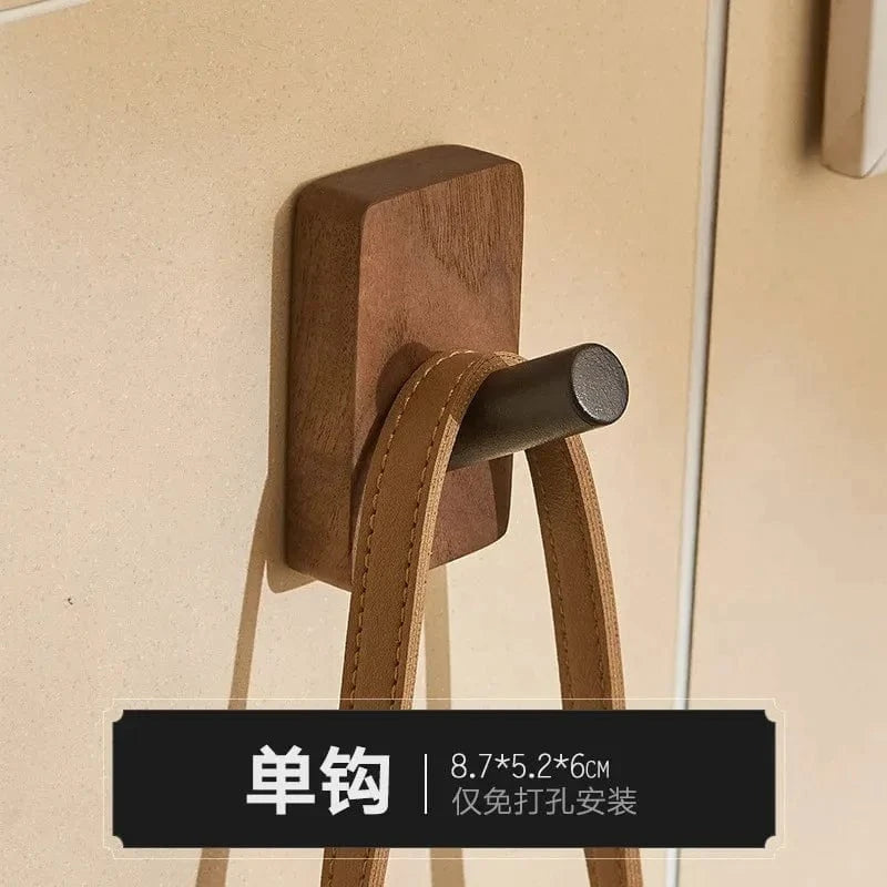 Introducing our Self-Adhesive Walnut Wood Hook, a stylish and functional wall hanger that adds a touch of natural warmth to any space. Crafted from solid walnut, this versatile hook features a premium self-adhesive backing for easy installation without d..