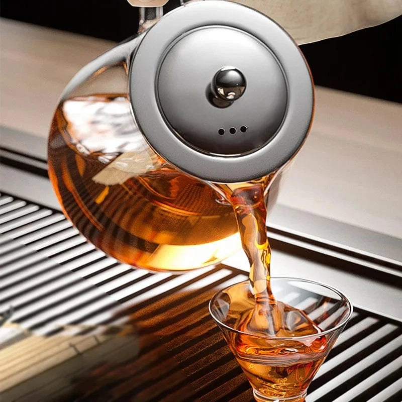 Introducing the Premium 500ml Glass Teapot with Stainless Steel Infuser, a modern and elegant addition to your tea ritual. Crafted from heat-resistant borosilicate glass, it preserves authentic flavors and features a removable stainless steel infuser for..