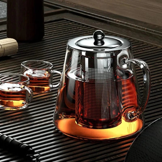 Introducing the Premium 500ml Glass Teapot with Stainless Steel Infuser, a modern and elegant addition to your tea ritual. Crafted from heat-resistant borosilicate glass, it preserves authentic flavors and features a removable stainless steel infuser for..