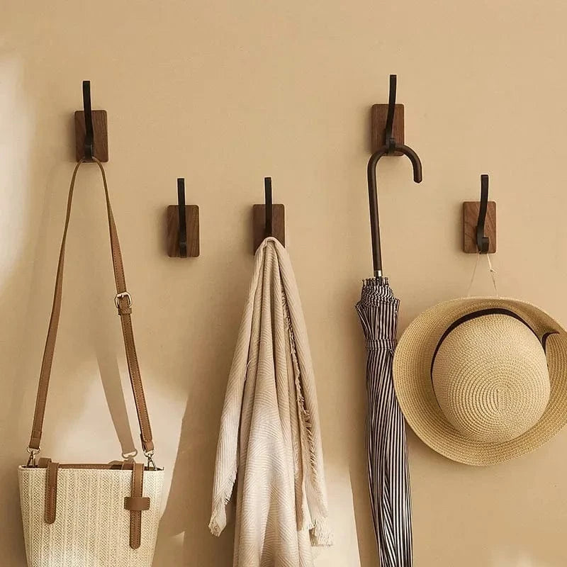 Introducing our Self-Adhesive Walnut Wood Hook, a stylish and functional wall hanger that adds a touch of natural warmth to any space. Crafted from solid walnut, this versatile hook features a premium self-adhesive backing for easy installation without d..